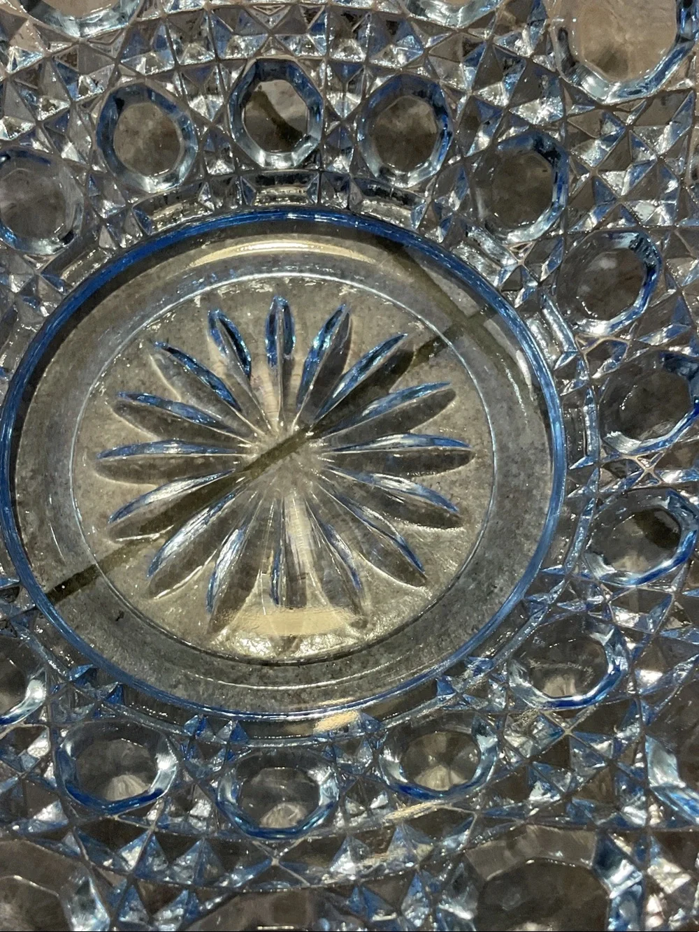 Windsor blue glass button and cane pattern.
